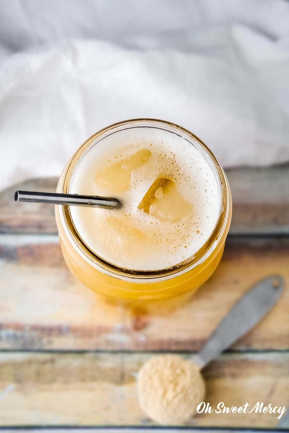 Overhead shot of mason jar with baobab water and ice