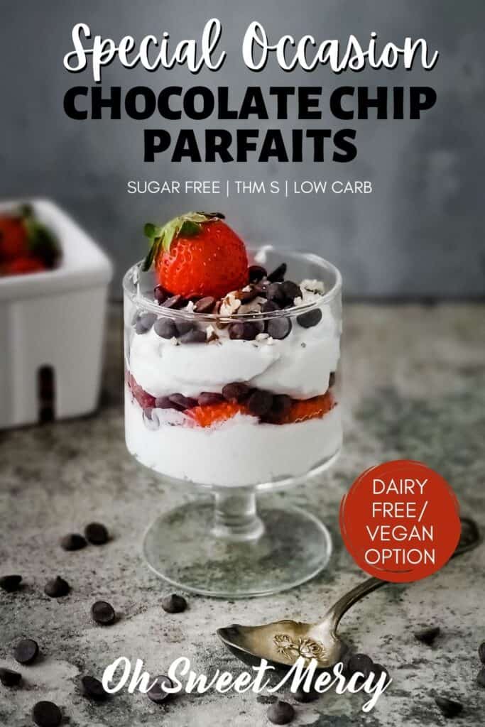 Pinterest Pin Image for Special Occasion Chocolate Chip Parfaits: Parfait glass with fluffy cream cheese layered with strawberries and chocolate chips, topped with whole strawberry, chocolate chips, pecan pieces. 