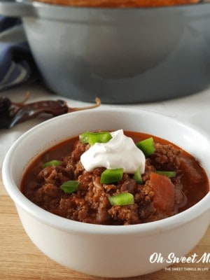 This Braised Chipotle Chili will fill your home with savory aromas and your belly with warming comfort. Make it low carb or low fat, a versatile family-pleasing dish for Trim Healthy Mama plan followers! #recipes #thm #chili #dutchoven #fallfoods #healthy #ohsweetmercy