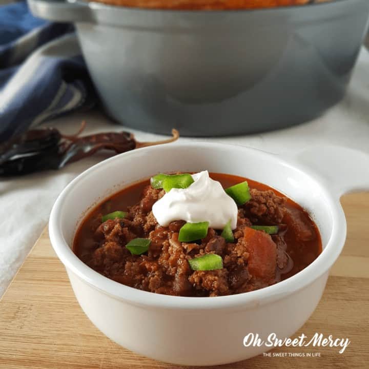 This Braised Chipotle Chili will fill your home with savory aromas and your belly with warming comfort. Make it low carb or low fat, a versatile family-pleasing dish for Trim Healthy Mama plan followers! #recipes #thm #chili #dutchoven #fallfoods #healthy #ohsweetmercy