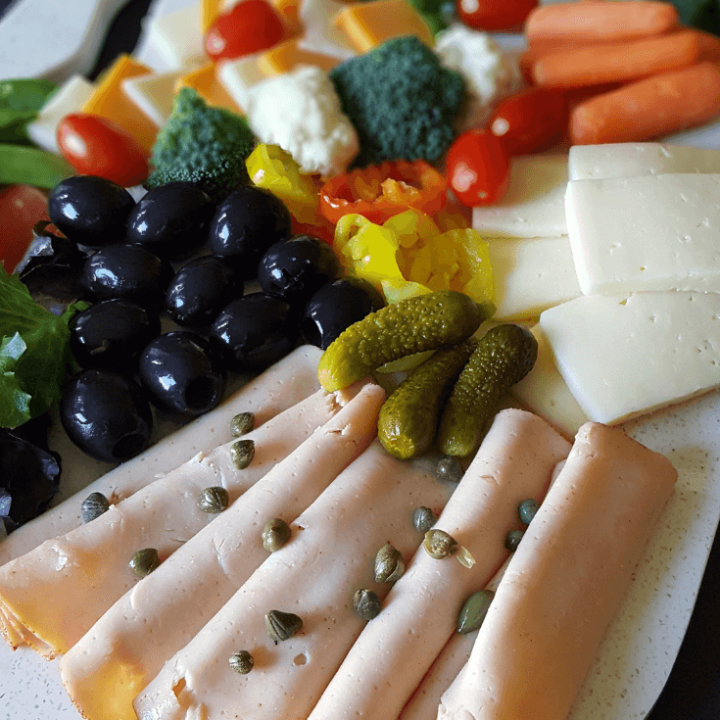 How to Make a Charcuterie Board for ANY Trim Healthy Mama Fuel Type! It's so easy to put together a healthy array of snackables for movie night at home, entertaining, or just because. #thm #recipes #charcuterieboard #thmsnacks #partyfoods