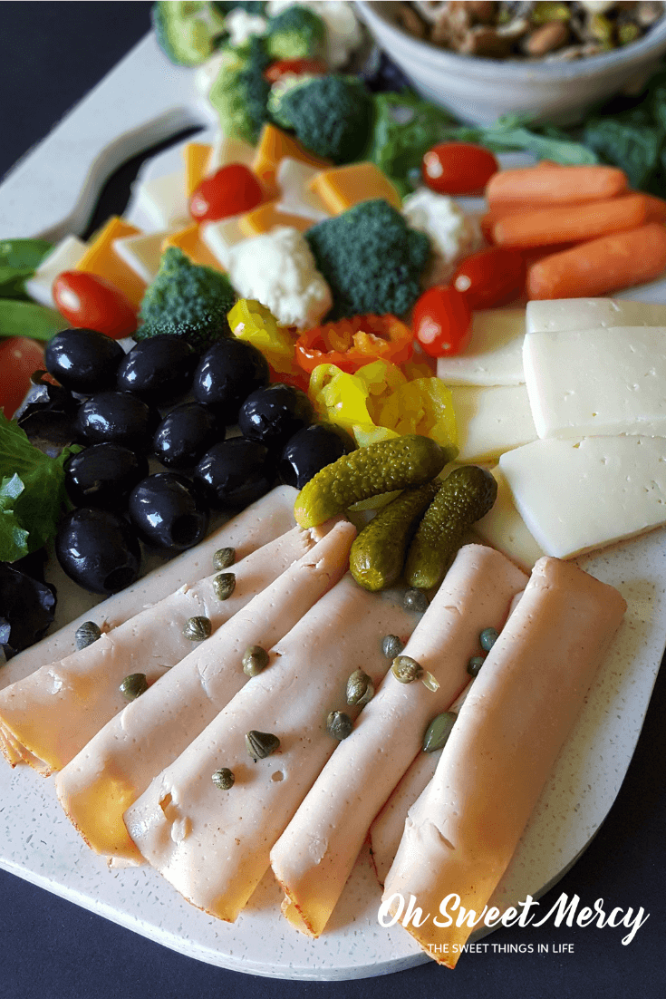 How to Make a Charcuterie Board for ANY Trim Healthy Mama Fuel Type! It's so easy to put together a healthy array of snackables for movie night at home, entertaining, or just because. #thm #recipes #charcuterieboard #thmsnacks #partyfoods