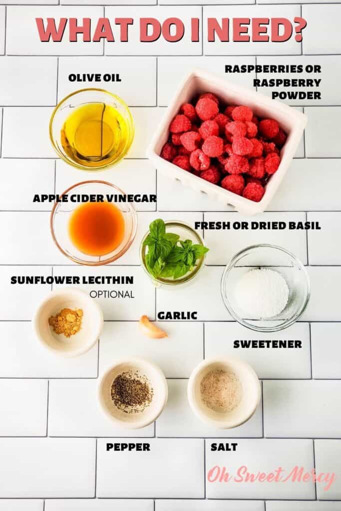 Raspberry Basil Vinaigrette Dressing ingredients: olive oil, apple cider vinegar, raspberries or raspberry powder, fresh or dried basil, garlic, sweetener, salt, pepper, optional sunflower lecithin