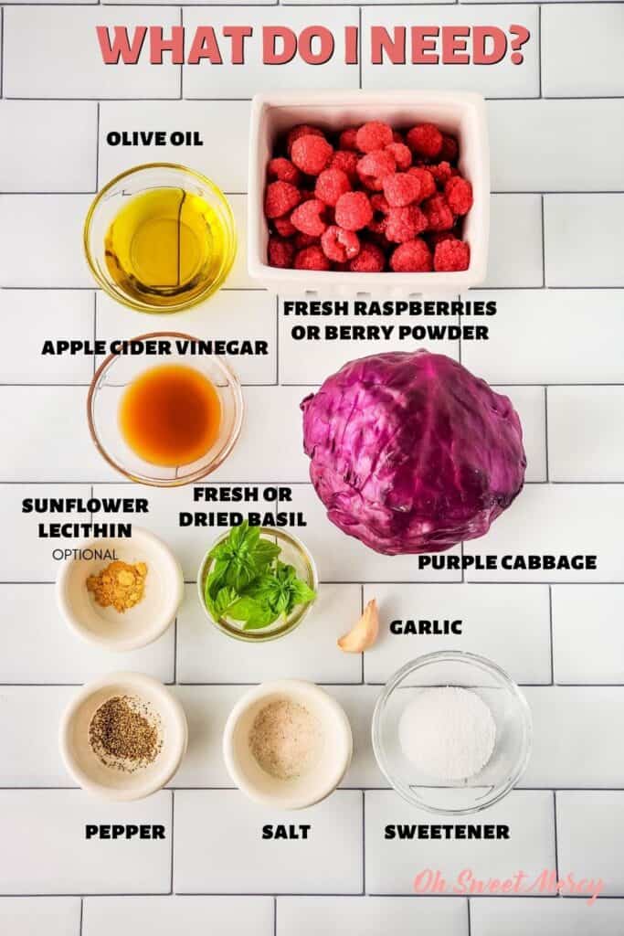 Raspberry Basil Coleslaw ingredients: purple cabbage, olive oil, apple cider vinegar, raspberries or raspberry powder, fresh or dried basil, sweetener, salt, pepper, garlic, sunflower lecithin (optional)