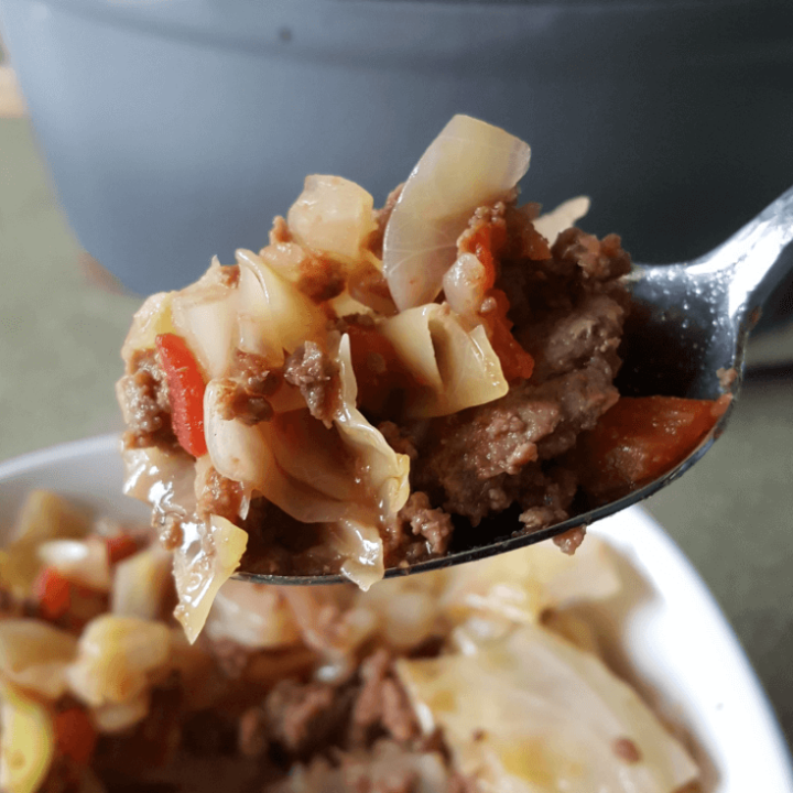 My Easy Cabbage and Sausage Stew is a tasty, filling, slimming recipe that only needs 4 ingredients! Delicious any time of year, too. #thm #lowcarb #easy #cabbage #recipes