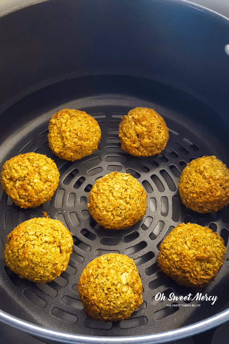 Crispy outside, moist and flavorful inside without deep frying? Yes! My Air Fryer Falafel with Creamy Tahini sauce is made without deep frying but you'll never miss the oil. THM E friendly, low fat, and so delicious! #thm #lowfat #airfryer #falafel