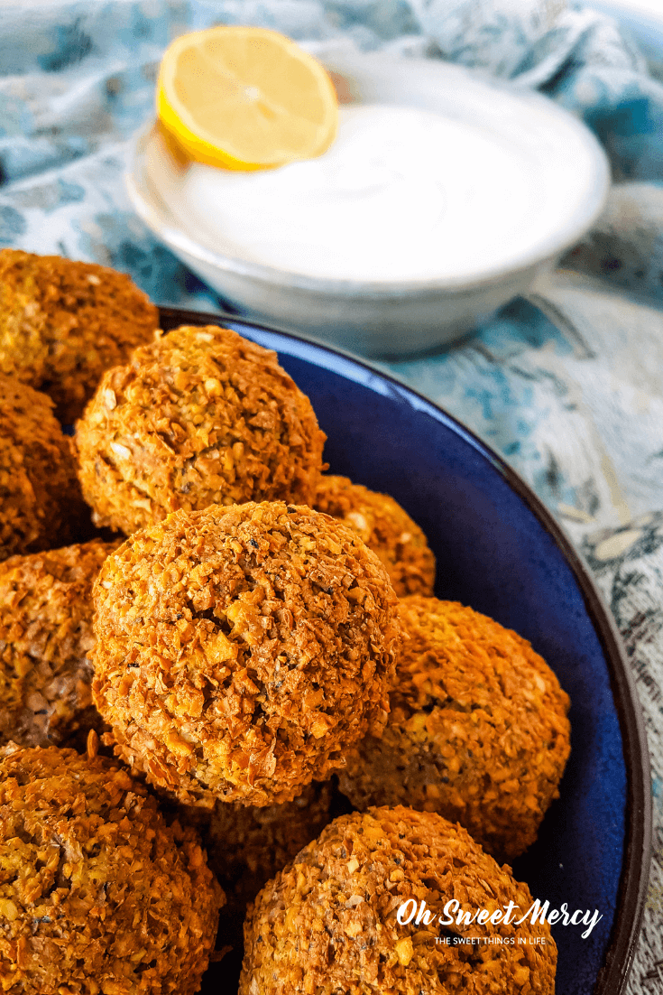 Crispy outside, moist and flavorful inside without deep frying? Yes! My Air Fryer Falafel with Creamy Tahini sauce is made without deep frying but you'll never miss the oil. THM E friendly, low fat, and so delicious! #thm #lowfat #airfryer #falafel