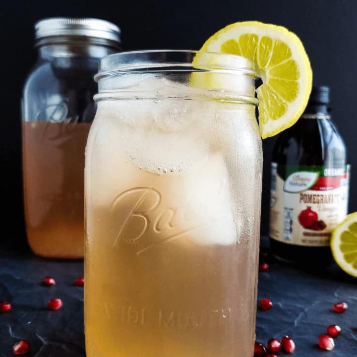 A delightful alternative to apple cider vinegar, raw pomegranate vinegar makes this Pomegranate Lemonade Good Girl Moonshine a healthy THM sipper. #sugarfree #thm #sipper