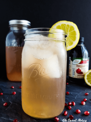A delightful alternative to apple cider vinegar, raw pomegranate vinegar makes this Pomegranate Lemonade Good Girl Moonshine a healthy THM sipper. #sugarfree #thm #sipper