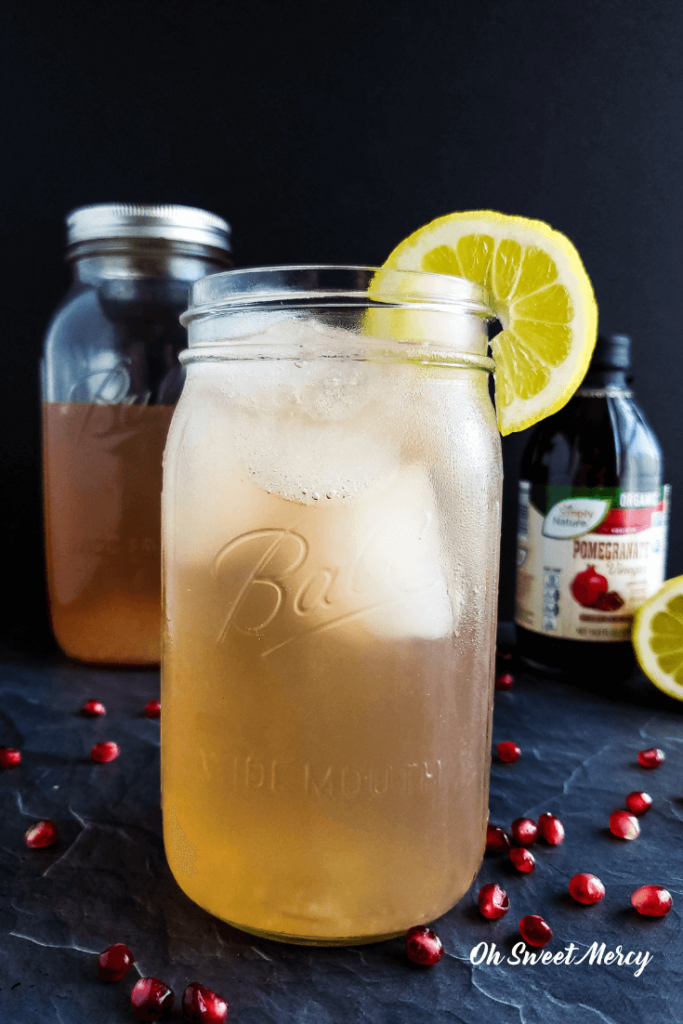 A delightful alternative to apple cider vinegar, raw pomegranate vinegar makes this Pomegranate Lemonade Good Girl Moonshine a healthy THM sipper. #sugarfree #thm #sipper