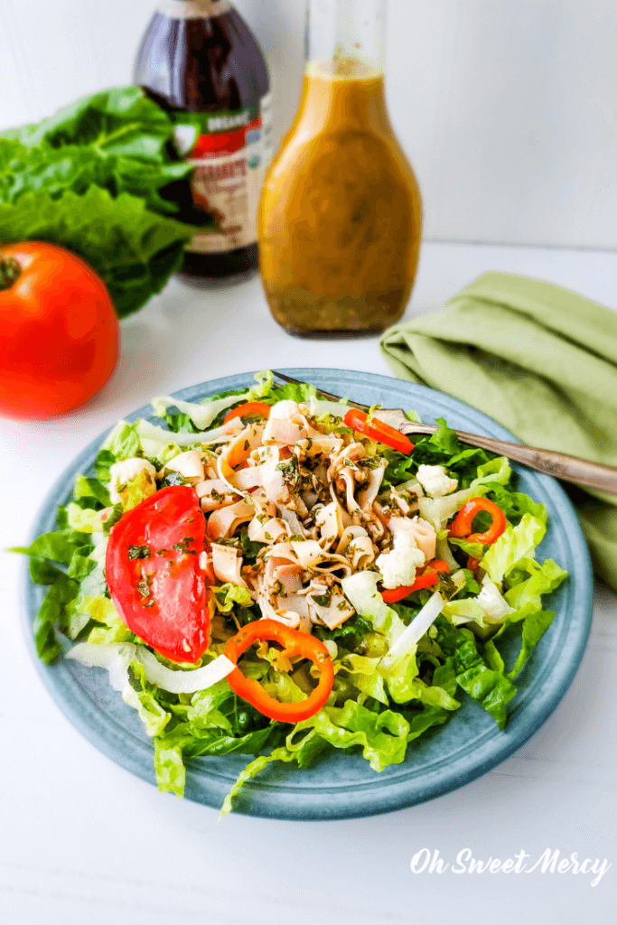 Plate of salad with Pomegranate Vinegar Salad Dressing