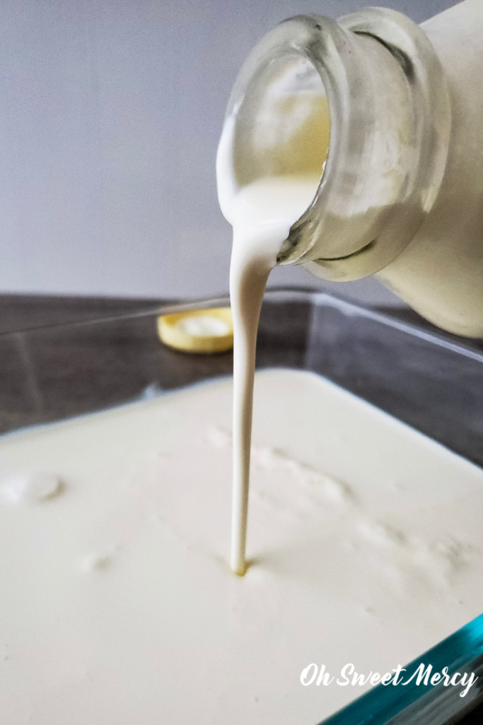 Pouring cream into baking dish