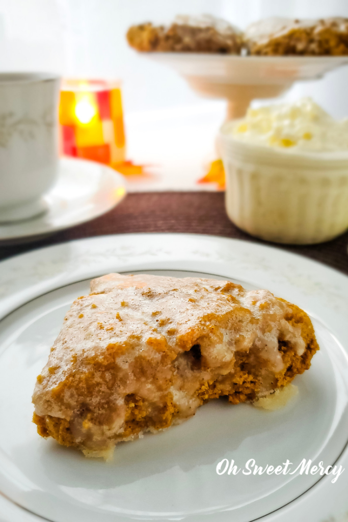 Plain glazed pumpkin scone on a plate