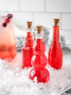 Sugar Free Cranberry Simple Syrup in decorative bottles