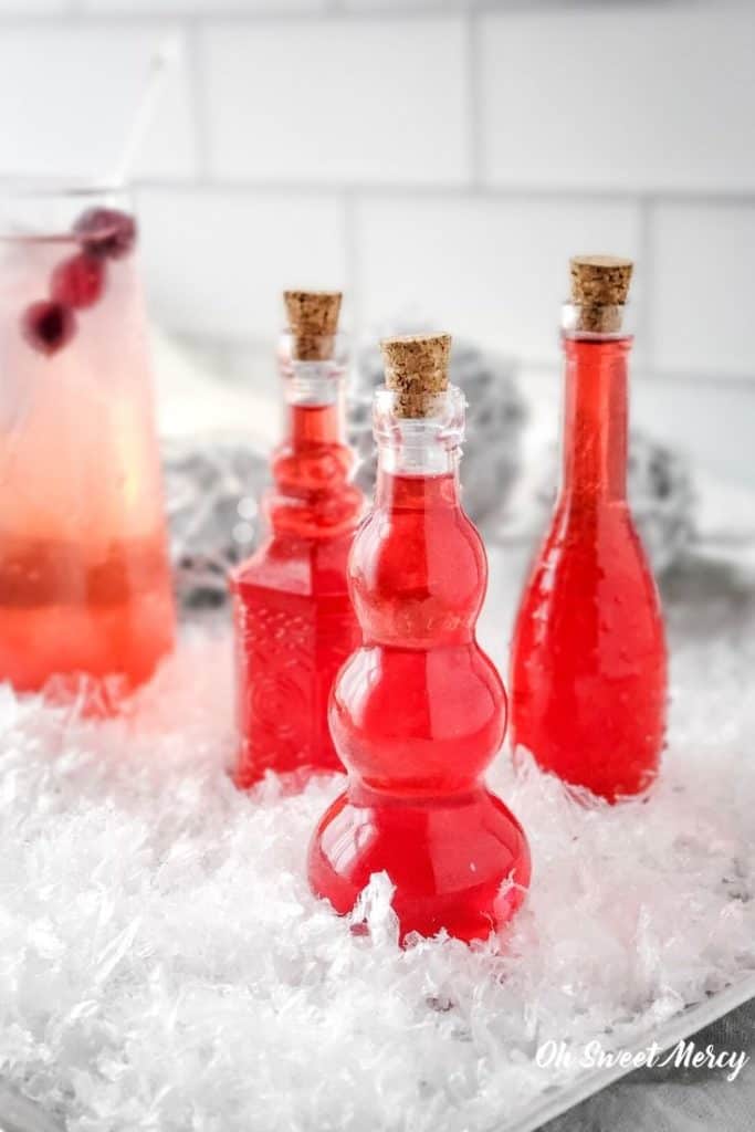 Sugar Free Cranberry Simple Syrup in decorative bottles