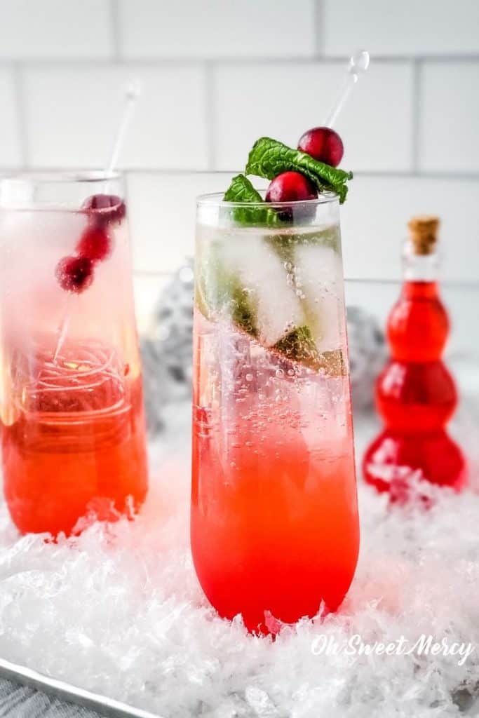 Sugar Free Sparkling Cranberry Mocktail in a glass with garnish.