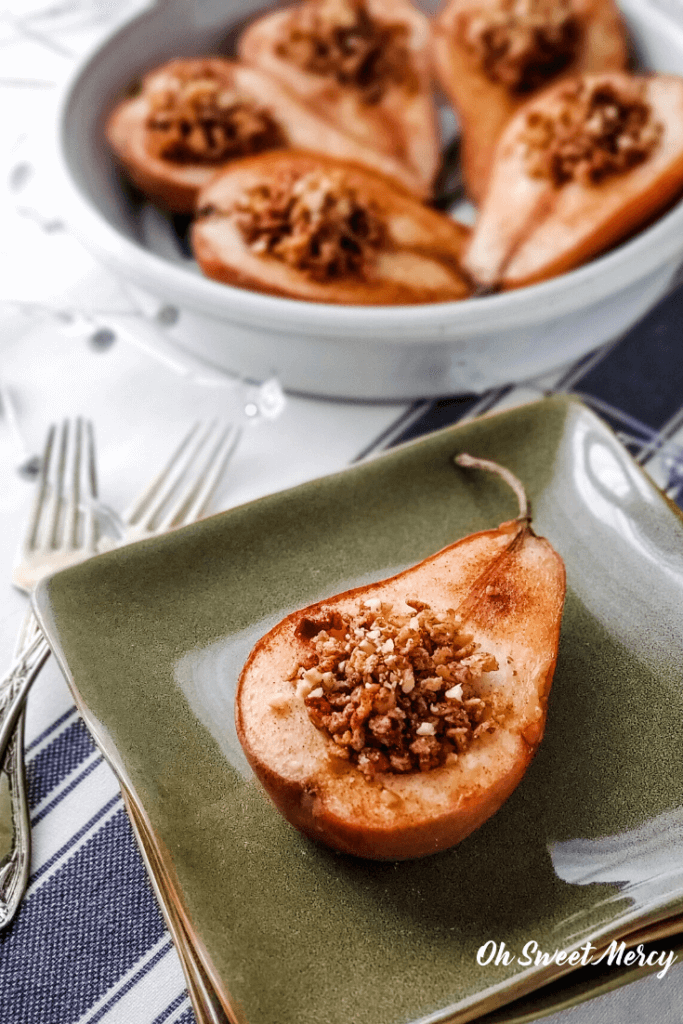 Baked pear half on a plate