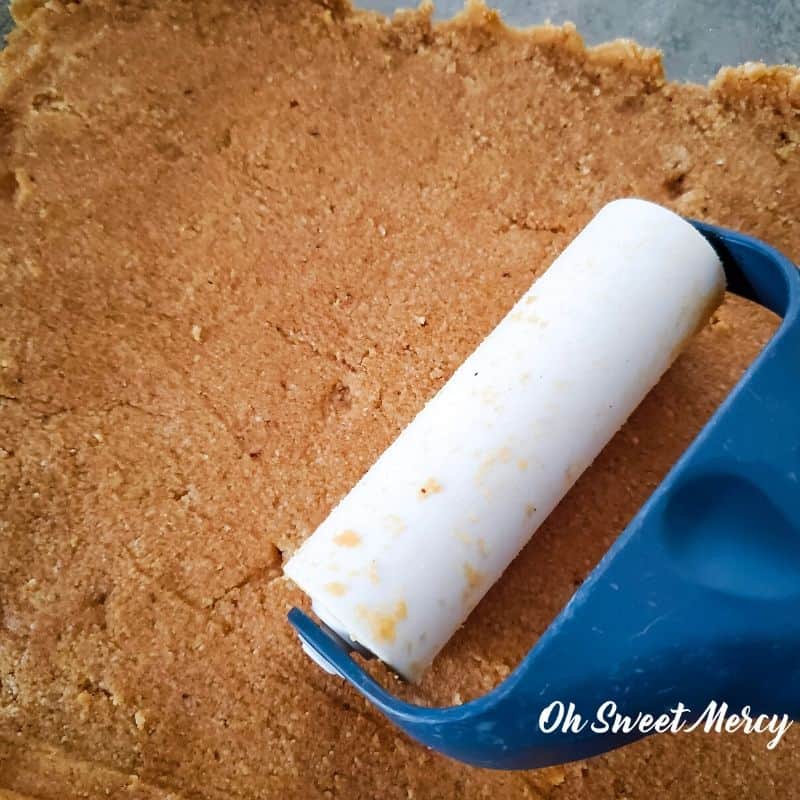 Pressing crust into baking dish