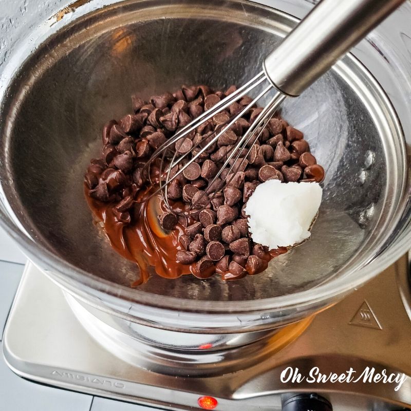 Melting sugar free chocolate chips and coconut oil for choclate coating