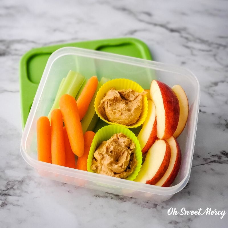 Energizing snack box - baby carrots, celery sticks, apple slices, Peanut Junkie Butter.