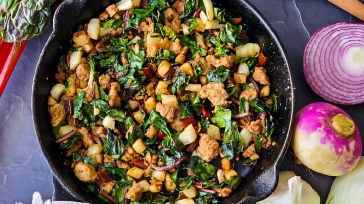 Cast iron skillet with turkey, fennel, and swiss chard hash
