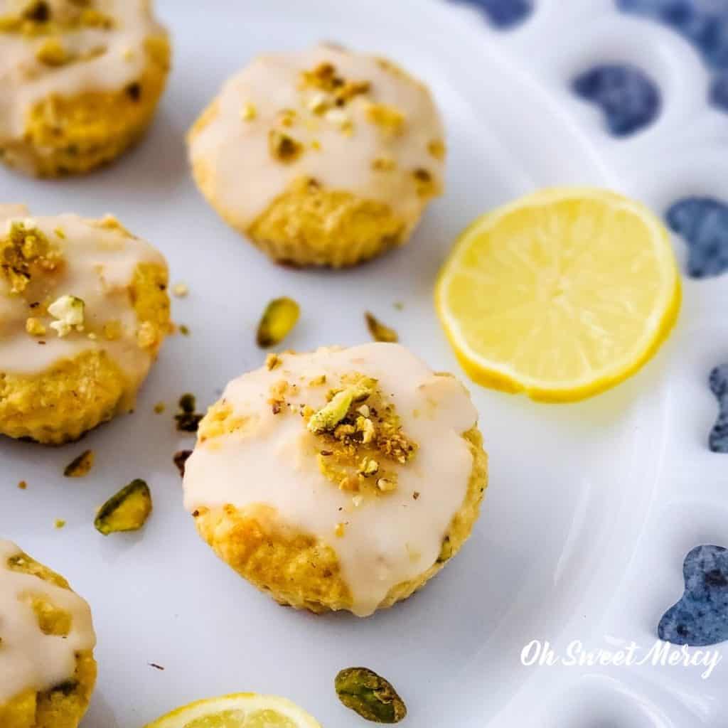 Platter of glazed lemon pistachio muffins