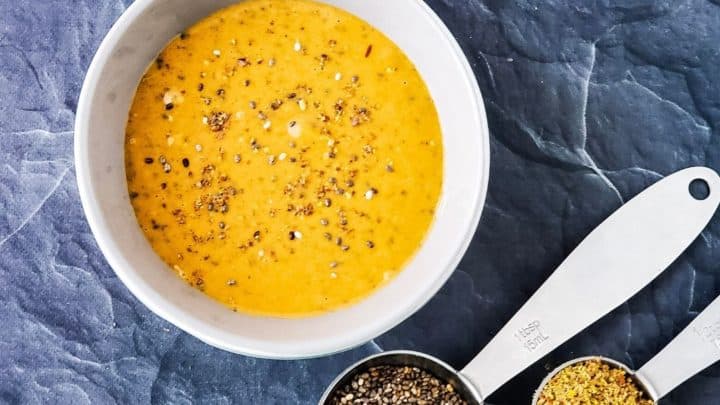 Bowl of peanut butter with flax and chia seeds spread