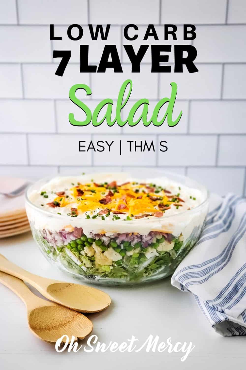 My Low Carb 7 Layer Salad is a THM-ified version of my mom's classic recipe. Layers of fresh veggies, turkey bacon, and cheese topped with a sweet, tangy, and creamy dressing. Perfect for make ahead meal prep, potlucks, BBQs, and more. #lowcarb #salads #thmrecipes #thmsalads #thm #sugarfree