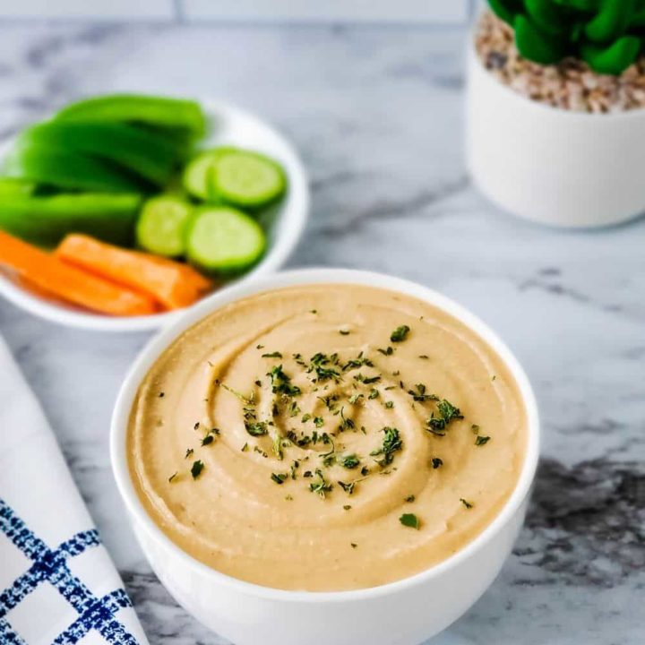 Bowl of Savory White Bean dip with veggies