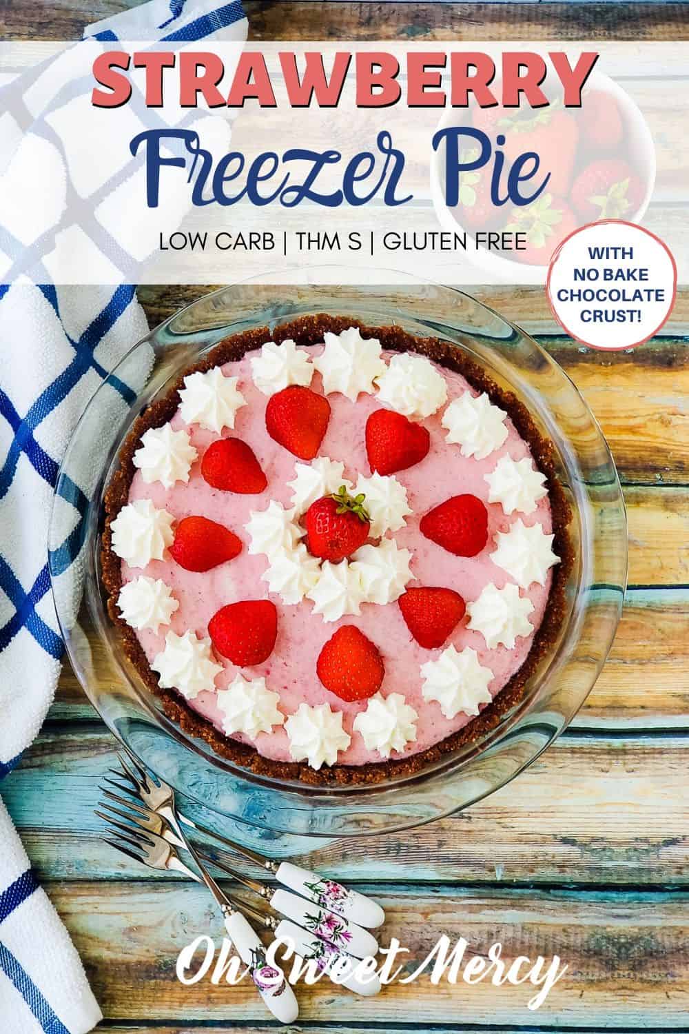 Too hot to bake? No problem! My easy Low Carb Strawberry Freezer Pie is totally no-bake! Strawberries and rich, whipped cream on a low carb chocolate crust means a delicious frozen summer treat perfect for hot days. #lowcarb #thm #thmdesserts #keto #strawberries #freezerpie @ohsweetmercy