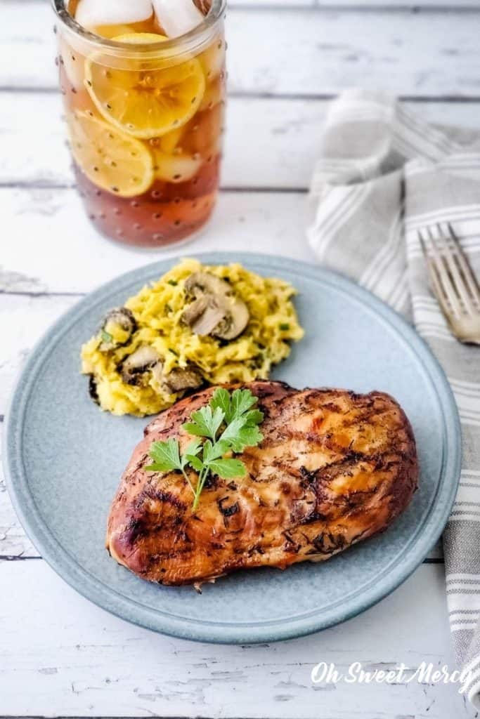 Sweet tea grilled chicken breast with buttery garlic, mushroom, and chive spaghetti squash for a low carb THM S meal.