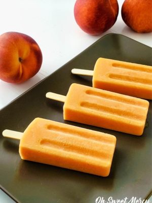 Fresh peach pops on a platter