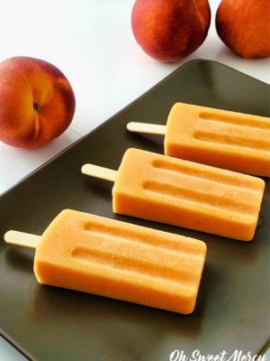 Fresh peach pops on a platter