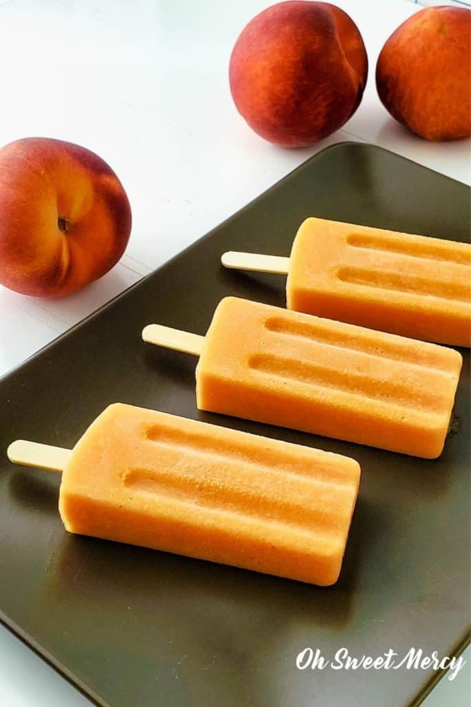 Fresh peach pops on a platter