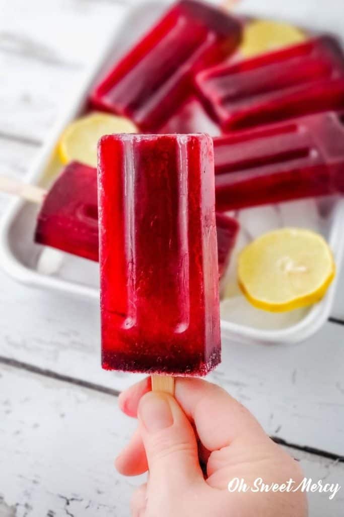 hand holding a popsicle