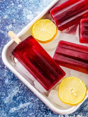 beautiful red popsicles on an ice filled tray