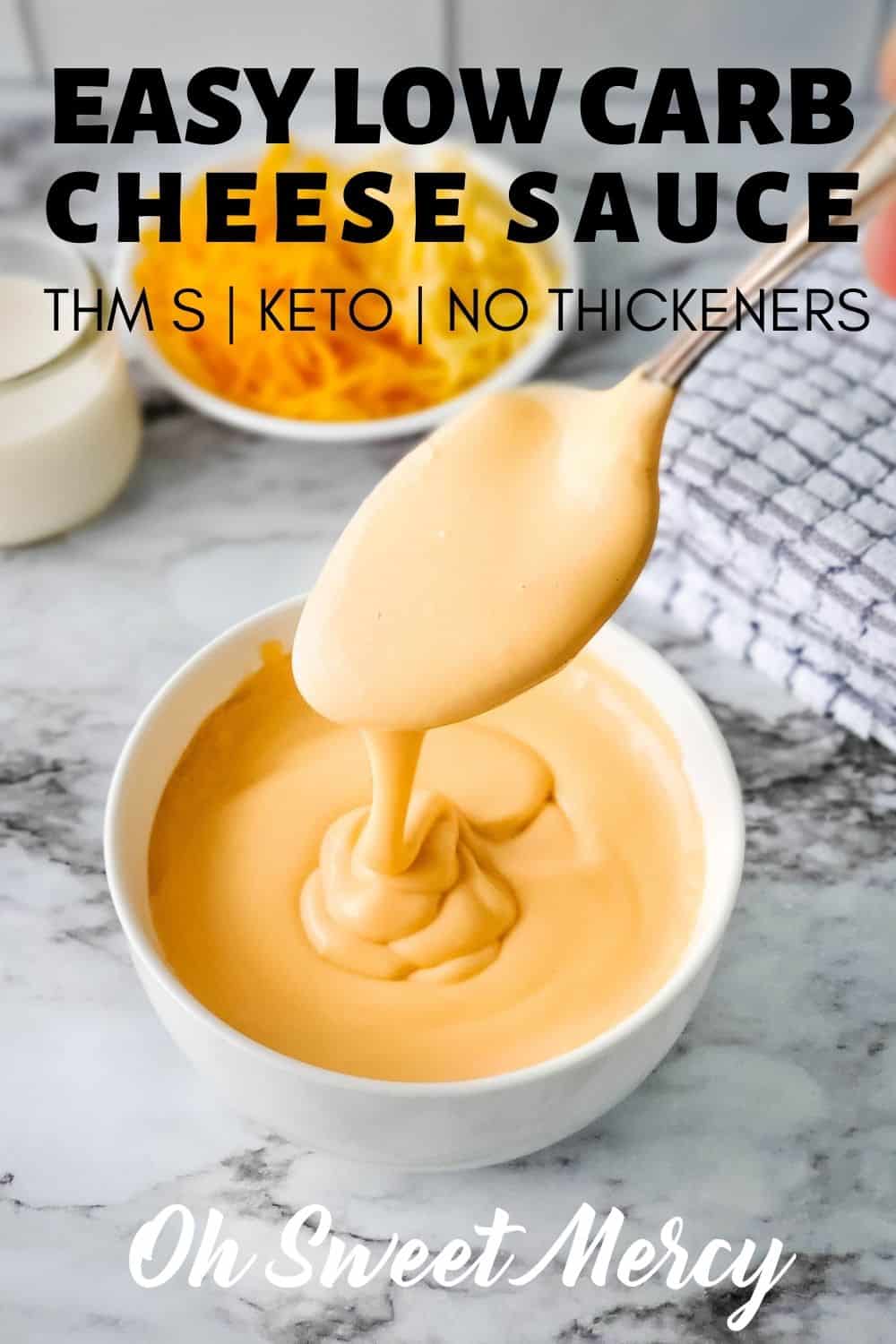 My Easy Low Carb Cheese Sauce takes less than 10 minutes to make, uses no starches or thickeners, and is 100% THM and keto friendly. No heavy cream, either! Perfect for casseroles, veggies, dips, or wherever you need low carb cheesy goodness. #lowcarb #keto #glutenfree #cheesesauce #thm @ohsweetmercy