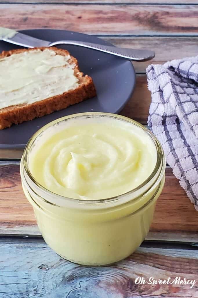 Small jar of buttery coconut oil spread