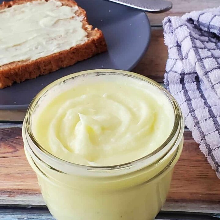 Small jar of buttery coconut oil spread