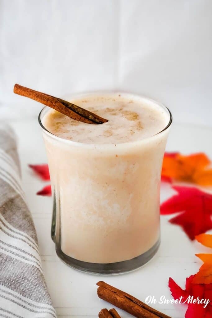 Glass of finished recipe garnished with cinnamon stick