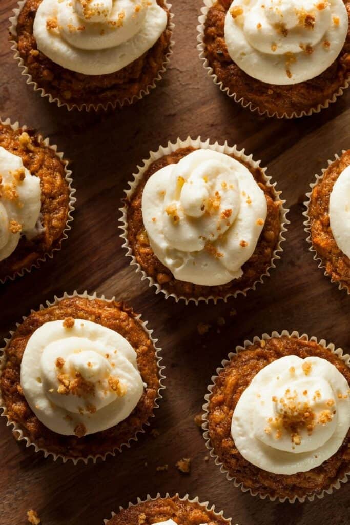 Overhead shot of carrot cake cupcakes with frosting