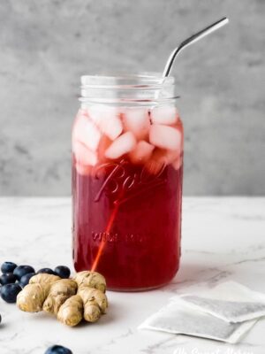 Mason jar of ginger blueberry good girl moonshine