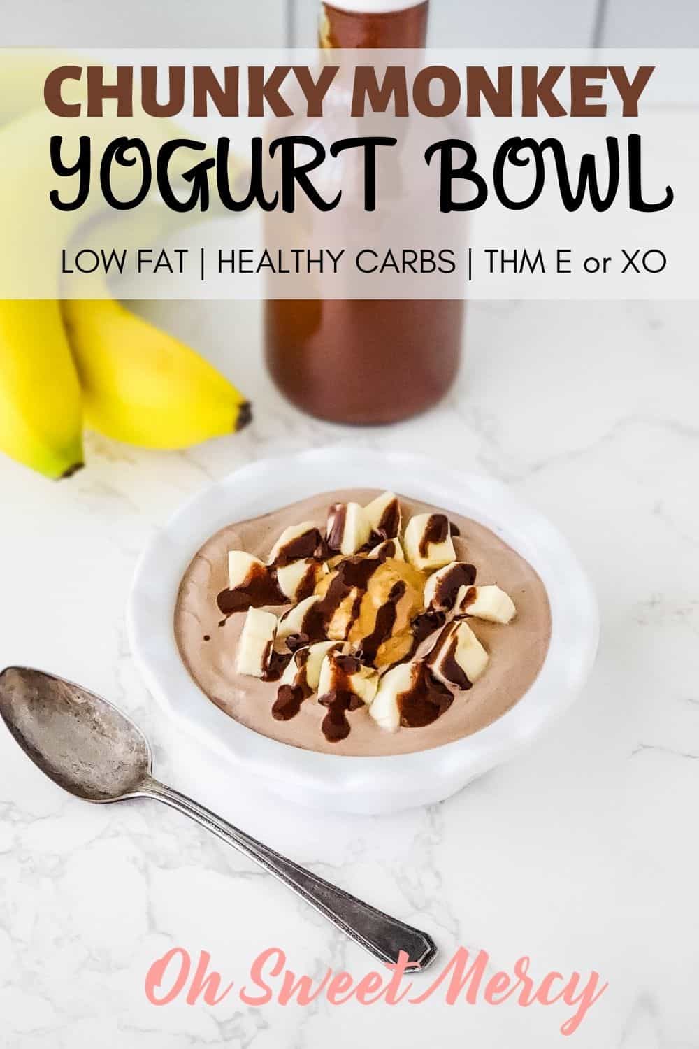 This 5 minute sweet treat satisfies that craving for bananas, chocolate, and peanut butter - in a low fat, healthy carb THM E style! Creamy chocolate yogurt topped with fresh bananas, chunky natural peanut butter, and drizzled with chocolate syrup, it tastes like something you shouldn't be eating. Easy to make a THM XO, too. #lowfat #healthycarbs #thm #trimhealthymama #chunkymonkey #yogurtbowls #chocolate #bananas #peanutbutter @ohsweetmercy