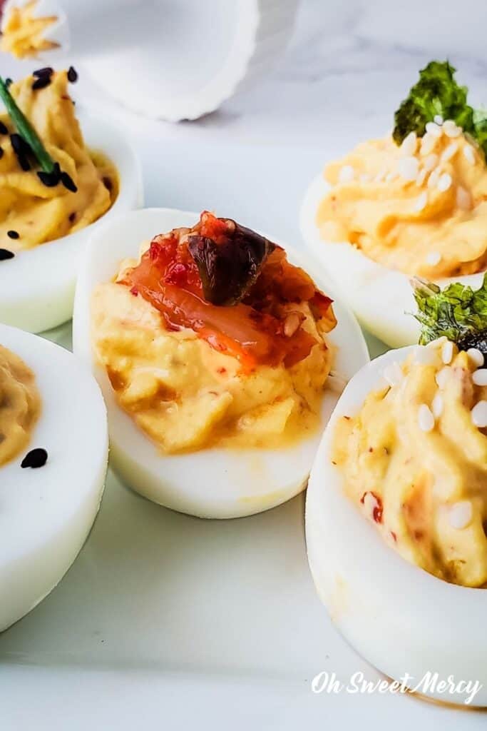 Close up of plate with kimchi deviled eggs