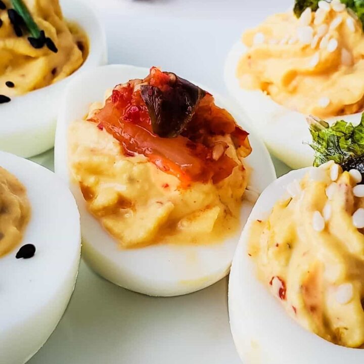Close up of plate with kimchi deviled eggs